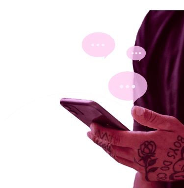 Tattooed man texting on social media